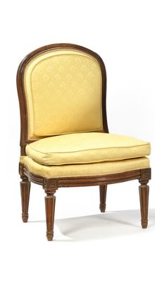 an image of a pair of chairs with a yellow upholstered seat