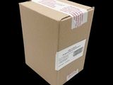 a box that is sitting on a black surface
