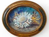 une photo d'un tableau représentant un tournesol dans un cadre doré