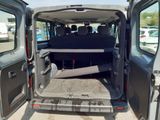 a small van with the door open and the back door open
