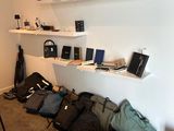a room with a lot of bags and bags on the floor