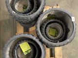 three cement pots sitting on top of a wooden pallet