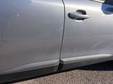 a car that is parked on the side of the road