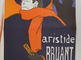 a poster of a man with a gun in his hand