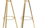 pair of brass bar stools with marble top