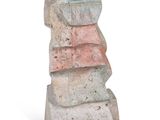 a stone sculpture of a face on a white background