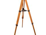 a wooden tripod on a white background with a white background
