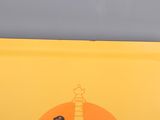 a yellow tray with a picture of a lighthouse on it