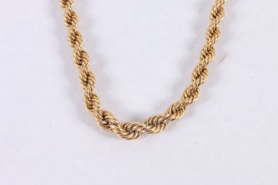 Collier en or jaune 750 ‰ torsadé en chute. - Photo 1