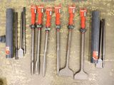 a lot of tools that are laying out on the floor