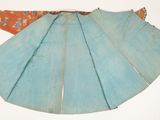 an image of a blue and orange skirt with a flowered design on it