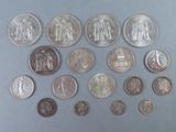 a lot of coins that are on the table