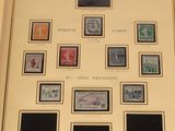 a picture of a framed picture of stamps on a wall
