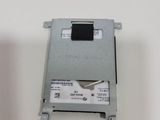a close up of a hard drive on a white surface