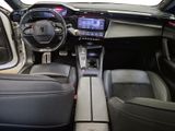 the interior of a car with a steering wheel and a dash board