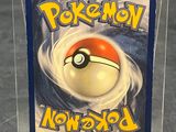 a close up of a pokemon card in a plastic case