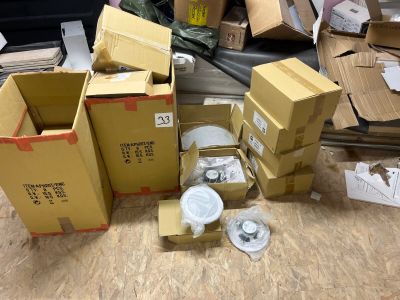 a pile of boxes and other items on the floor