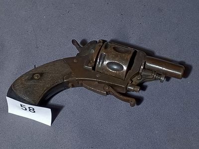 a small gun that is on a table