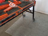 an image of a workbench with tools on it