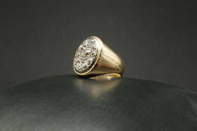 Bague en or jaune 750 sertie d'un pavage de diamants pour 0.…