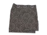 black and white patterned skirt with buttons on a white background