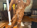 a large piece of wood sitting on top of a wooden floor