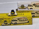 two toy cars that are sitting on top of each other