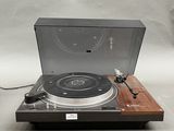 a record player that is sitting on a table