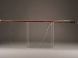 an image of a wooden and acrylic table with a glass base