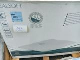 packaging for a new laptop computer sitting on top of a pallet