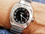 a close up of a person ' s wrist with a watch on it