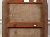 an old wooden window frame with a burlocked window on the inside