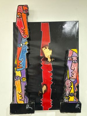 une photo d'une œuvre d'art accrochée au mur