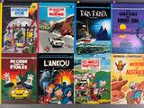 several children ' s books are lined up on a wall