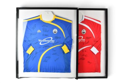 a framed picture of a soccer jersey and a signed shirt