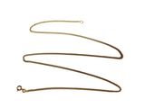 a close up of a gold chain on a white background