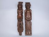pair of carved wood figures of a man and a woman