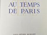 an open book with a picture of the words au tempss de paris on it
