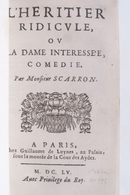 a black and white image of a book with a bunch of flowers