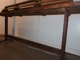 an image of a wooden bench in a room