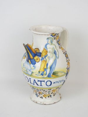 a white vase with a blue and yellow design on it
