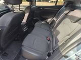 the back seats of a car with a seat belt in the back of it