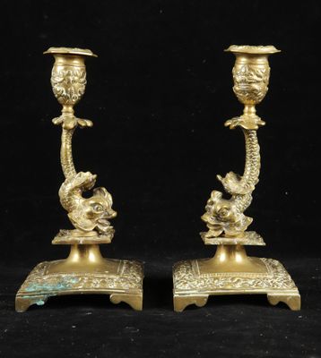 pair of antique brass candlesticks with dragon heads on stands