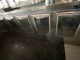 an image of a commercial kitchen with a lot of counter space