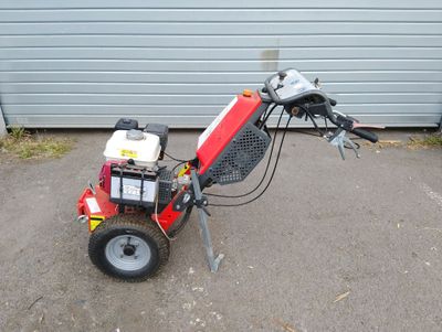 a small machine that is sitting in the dirt