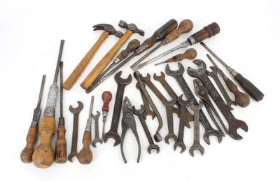 a lot of tools that are laying out on the table