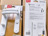 two boxes with a white door handle and a white door handle