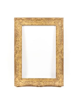 a gold picture frame on a white background