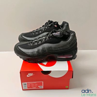 the nike air max 95 is in a box on a table