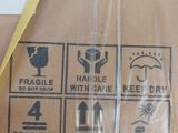 a brown box with a yellow ribbon on top of it